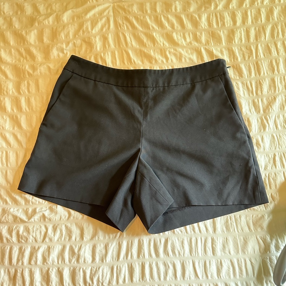 Cremieux black short with pocket size 4